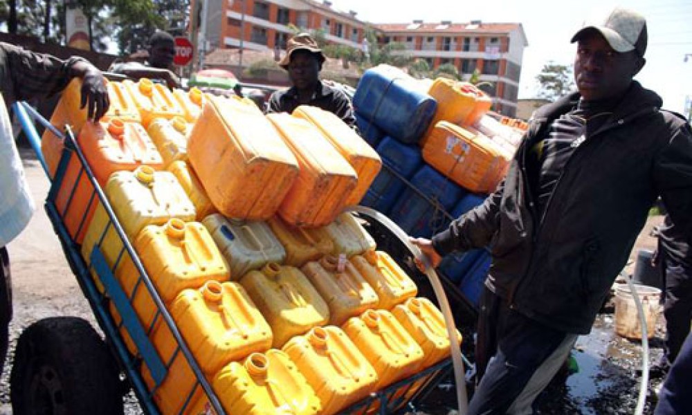A file photo of a water vendor in Eastlands,Nairobi selling water to residents following water rationing.PHOTO/FILE