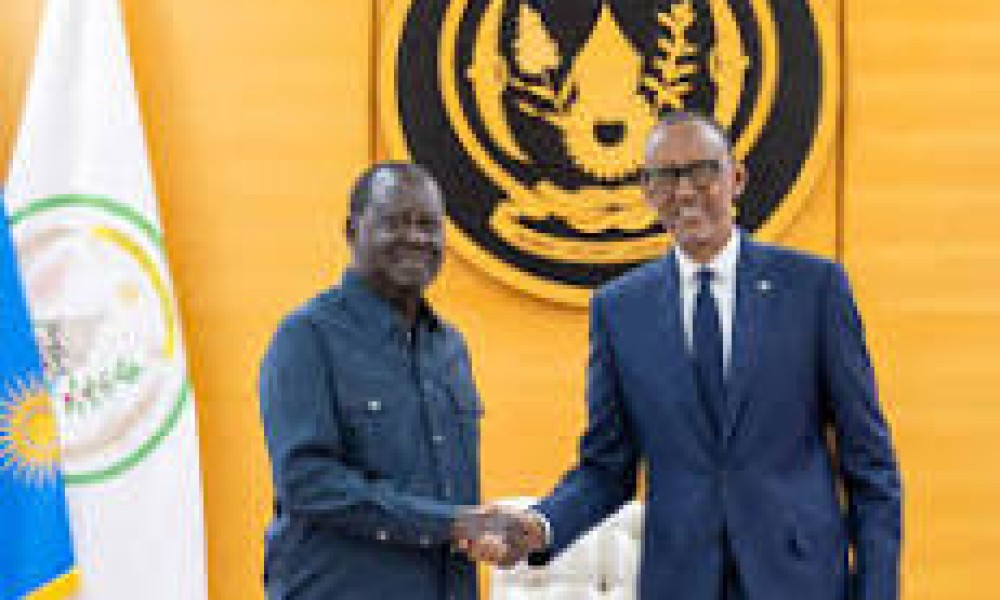 Raila Odinga(L) with Rwandan President Paul Kagame during a recent meeting in Kigali.PHOTO/CREDIT